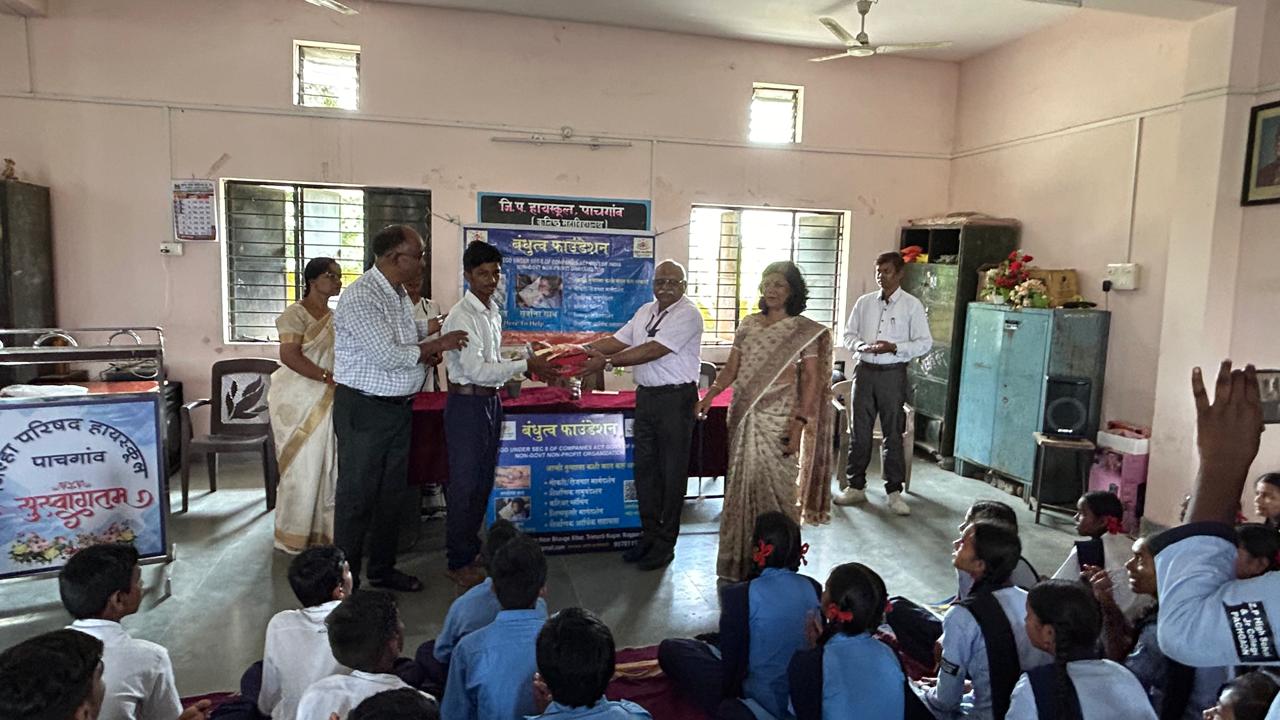 A student being recognised at a Bandhutva community programme