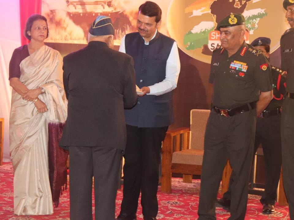 Felicitation at a formal Bandhutva Foundation event